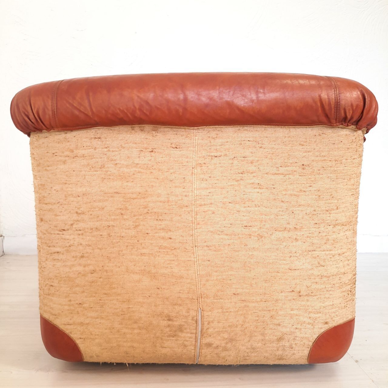 Four vintage armchairs, leather and fabric, 70s