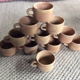 Series of 11 sandstone cups
