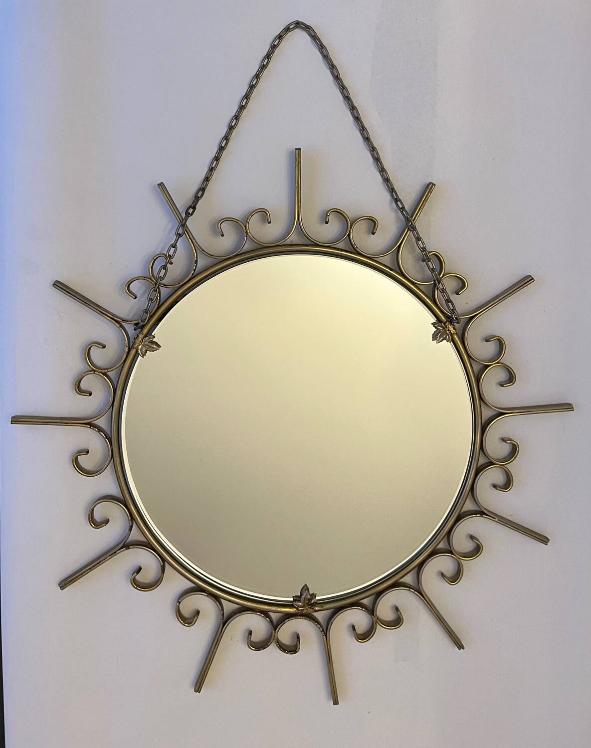 Gold metal sun mirror