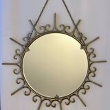 Miroir soleil en métal doré