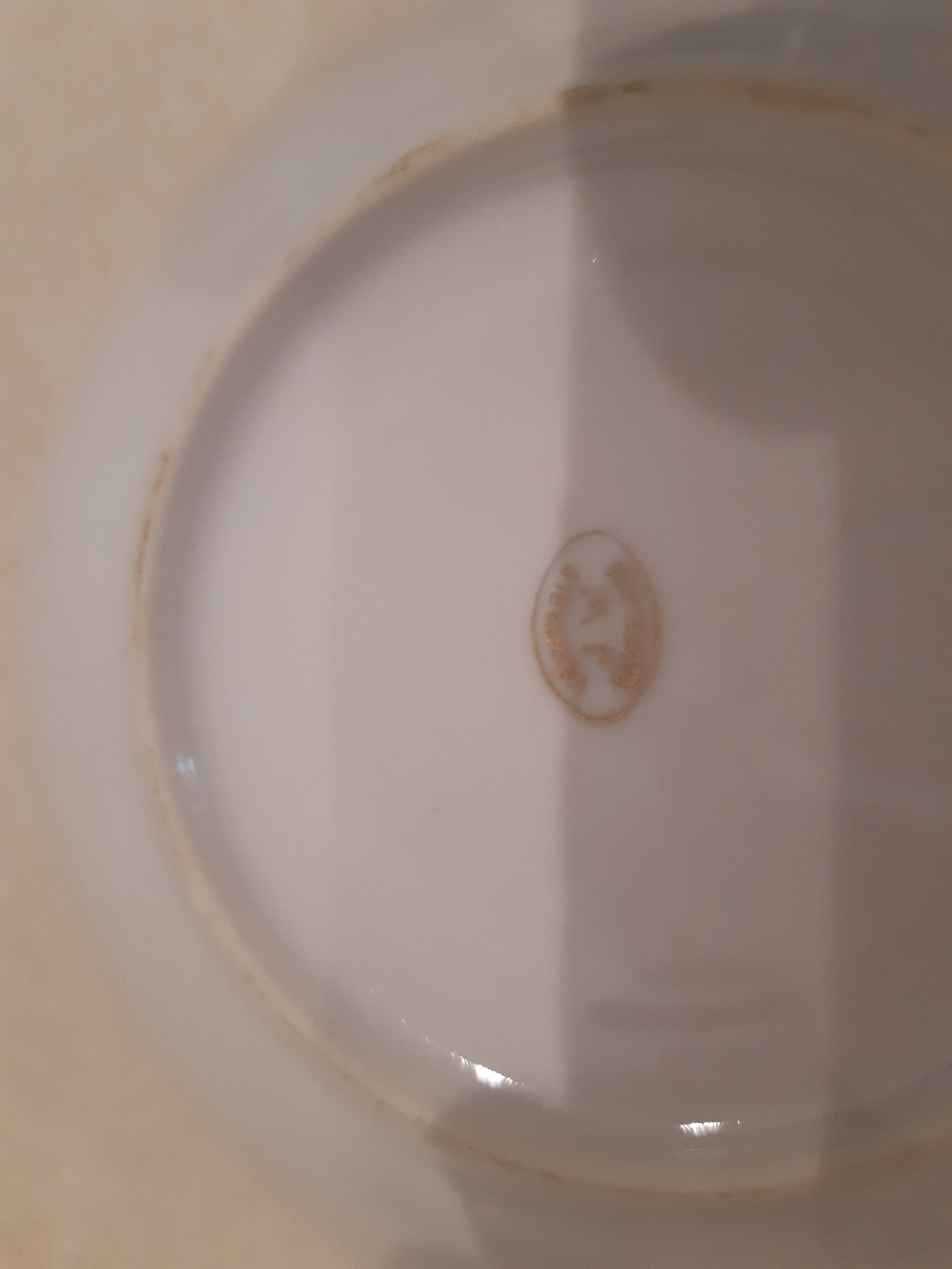 Breakfast set in white porcelain with floral decoration, 1930s.