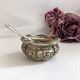 Silver metal salter and glass with salt shovel