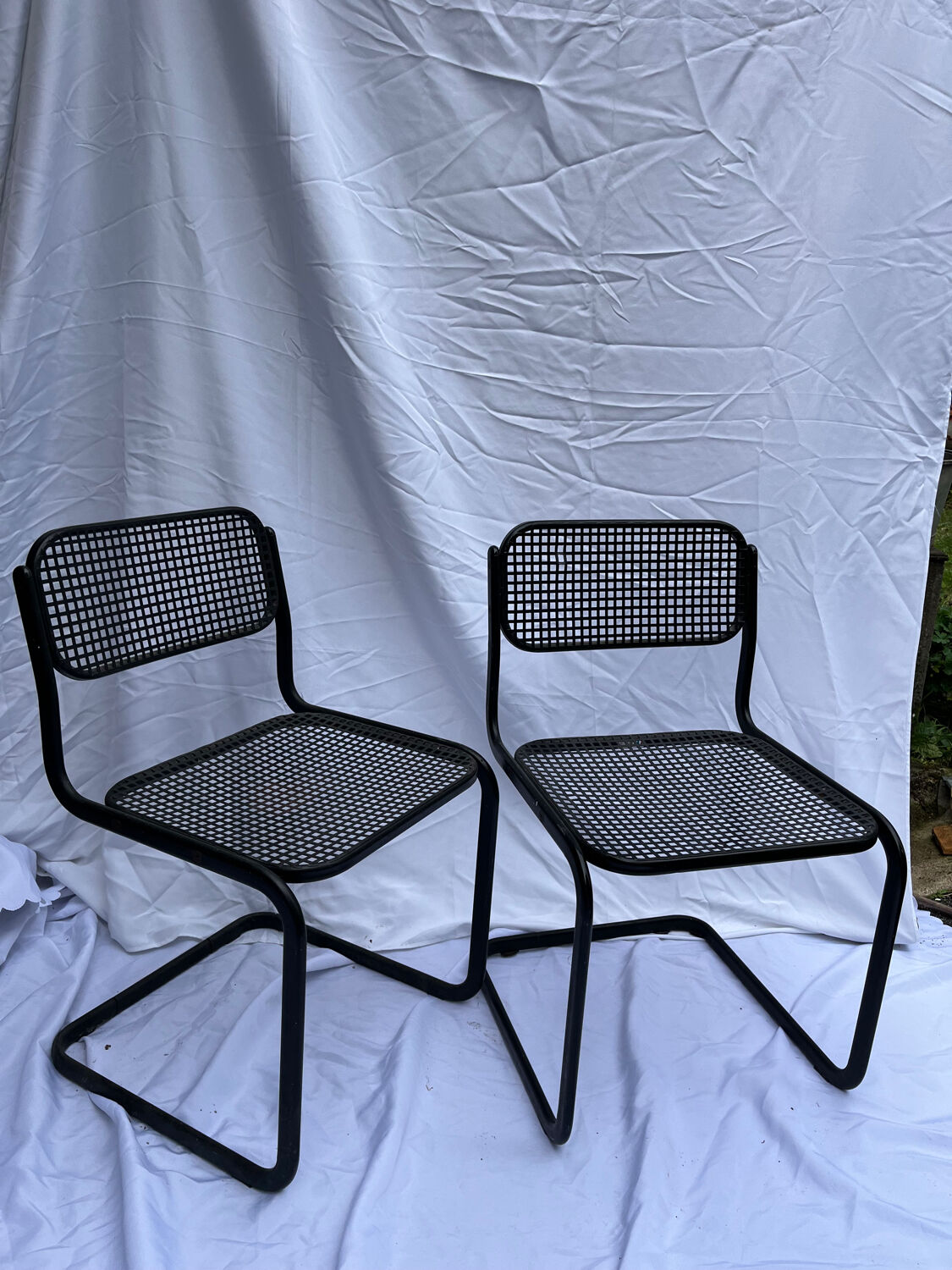 2 metal chairs