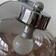 Wall light in chromed metal and smoked grey glass globe