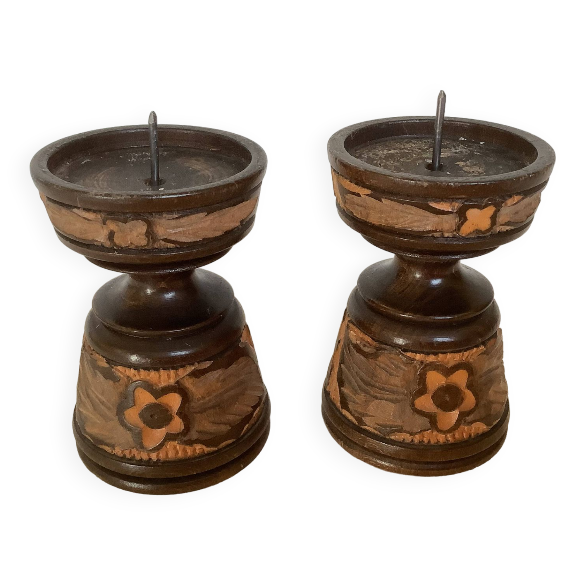 Pair of carved wooden candlesticks