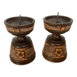 Pair of carved wooden candlesticks