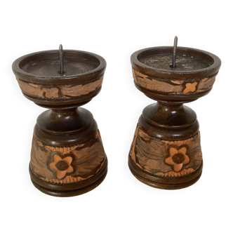Pair of carved wooden candlesticks