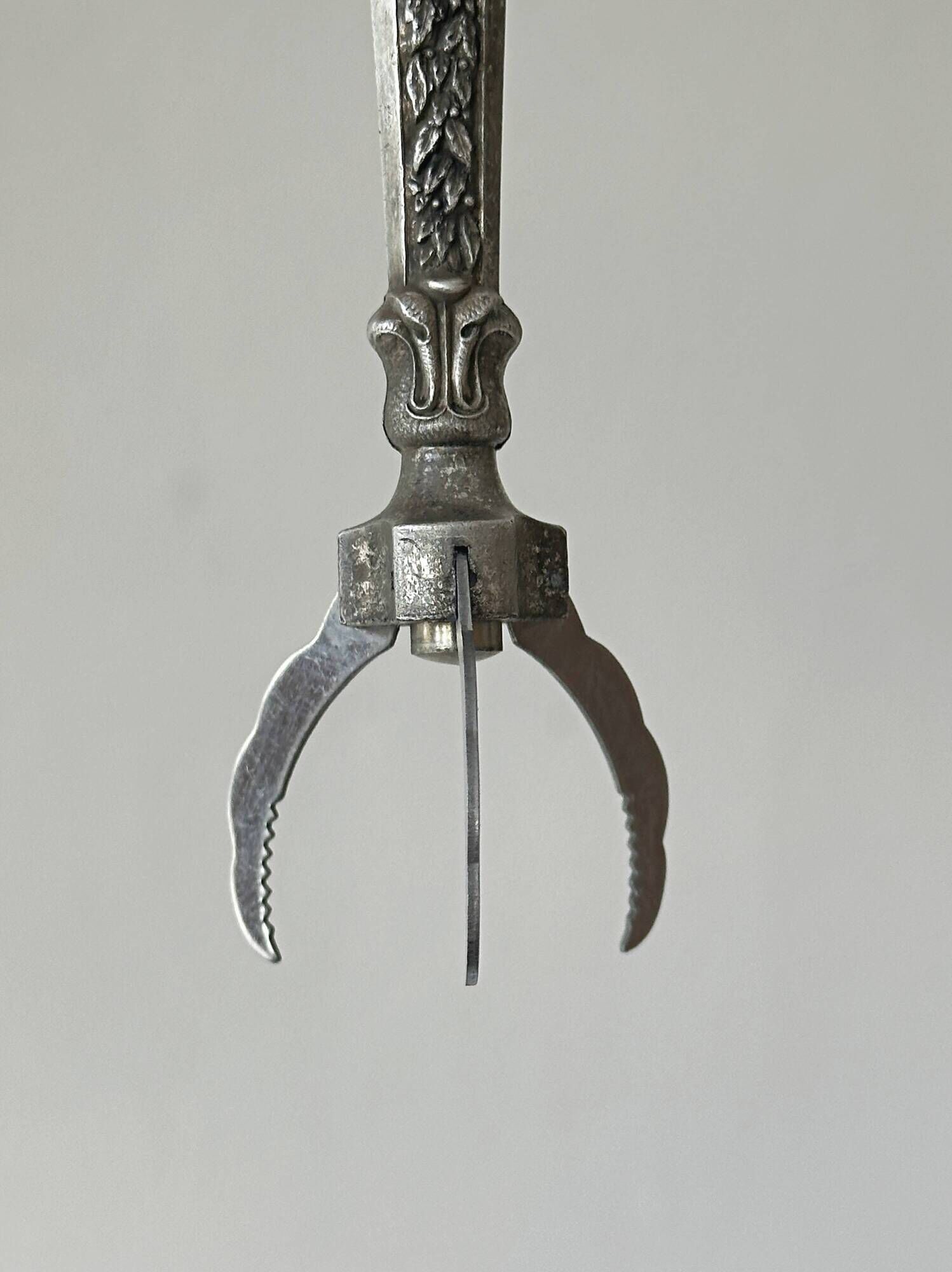 Antique metal sugar tongs
