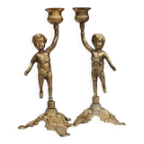 2 bougeoirs anciens chérubin en laiton