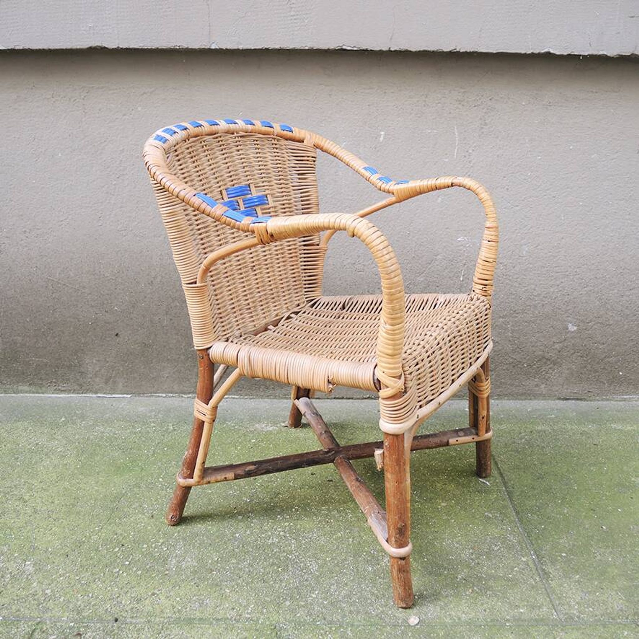 Old wicker chair for children
