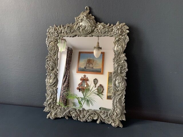 Antique Italian mirror in repoussé silver metal