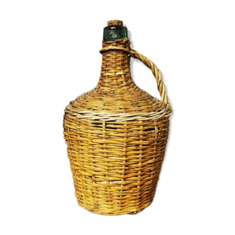 Demijohn dressed in wicker