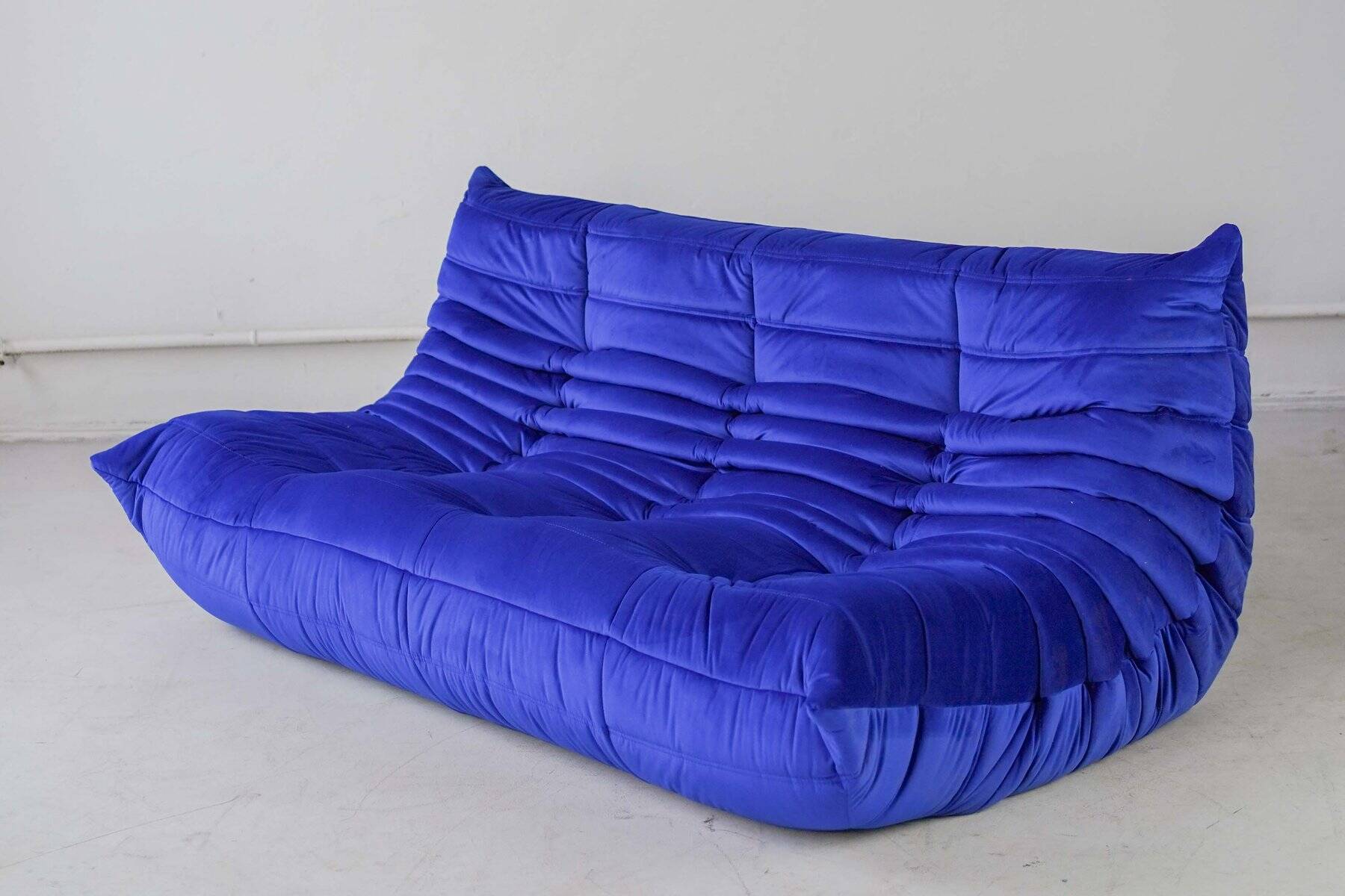 Togo three-seat sofa in blue velvet by Michel Ducaroy for Ligne Roset