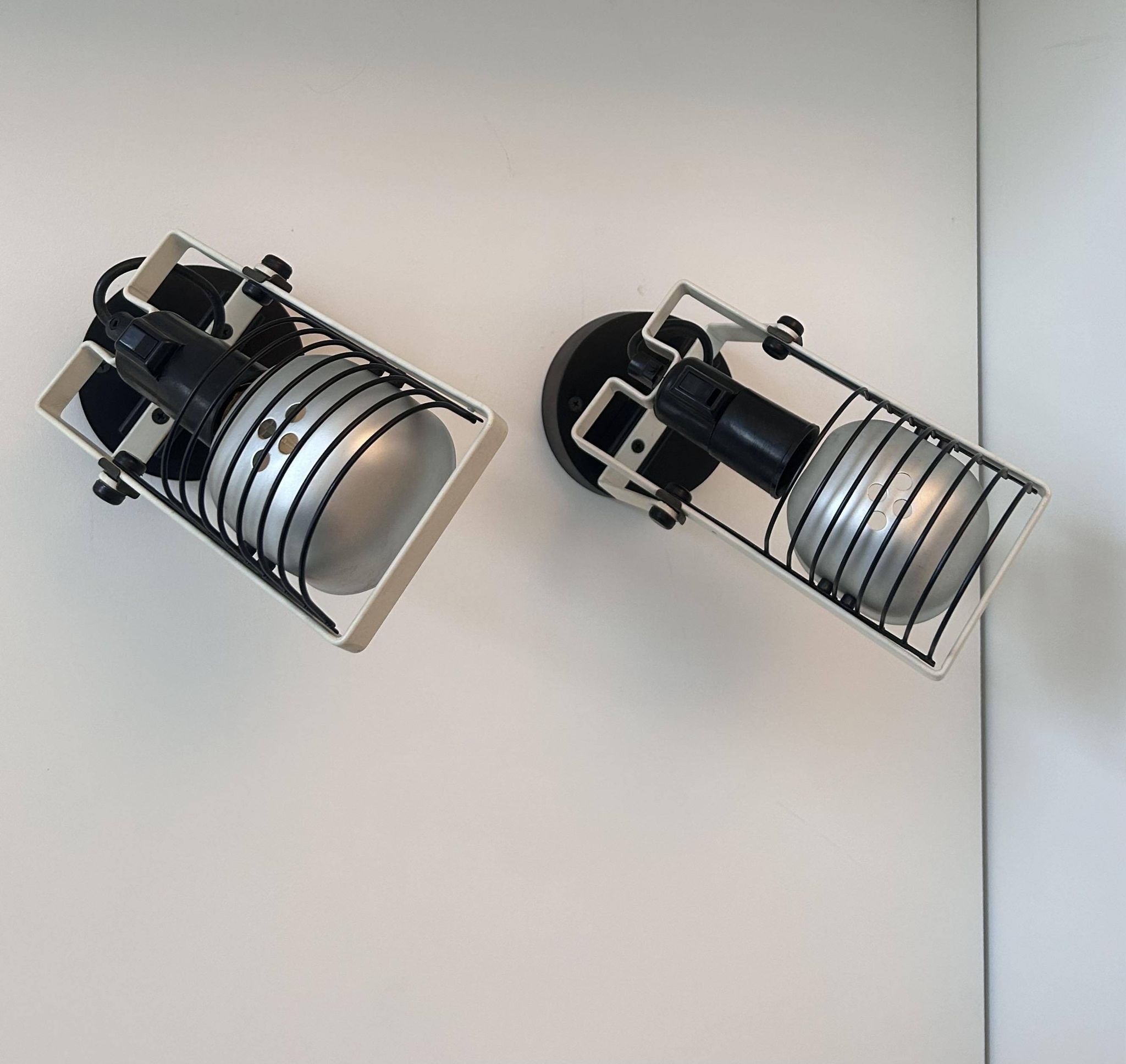 Pair of vintage Sintesi adjustable wall lights, by Gismonti for Artemide, Italy 1975