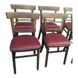 Set of 4 bistro chairs in curved wood and vintage red skai seats.