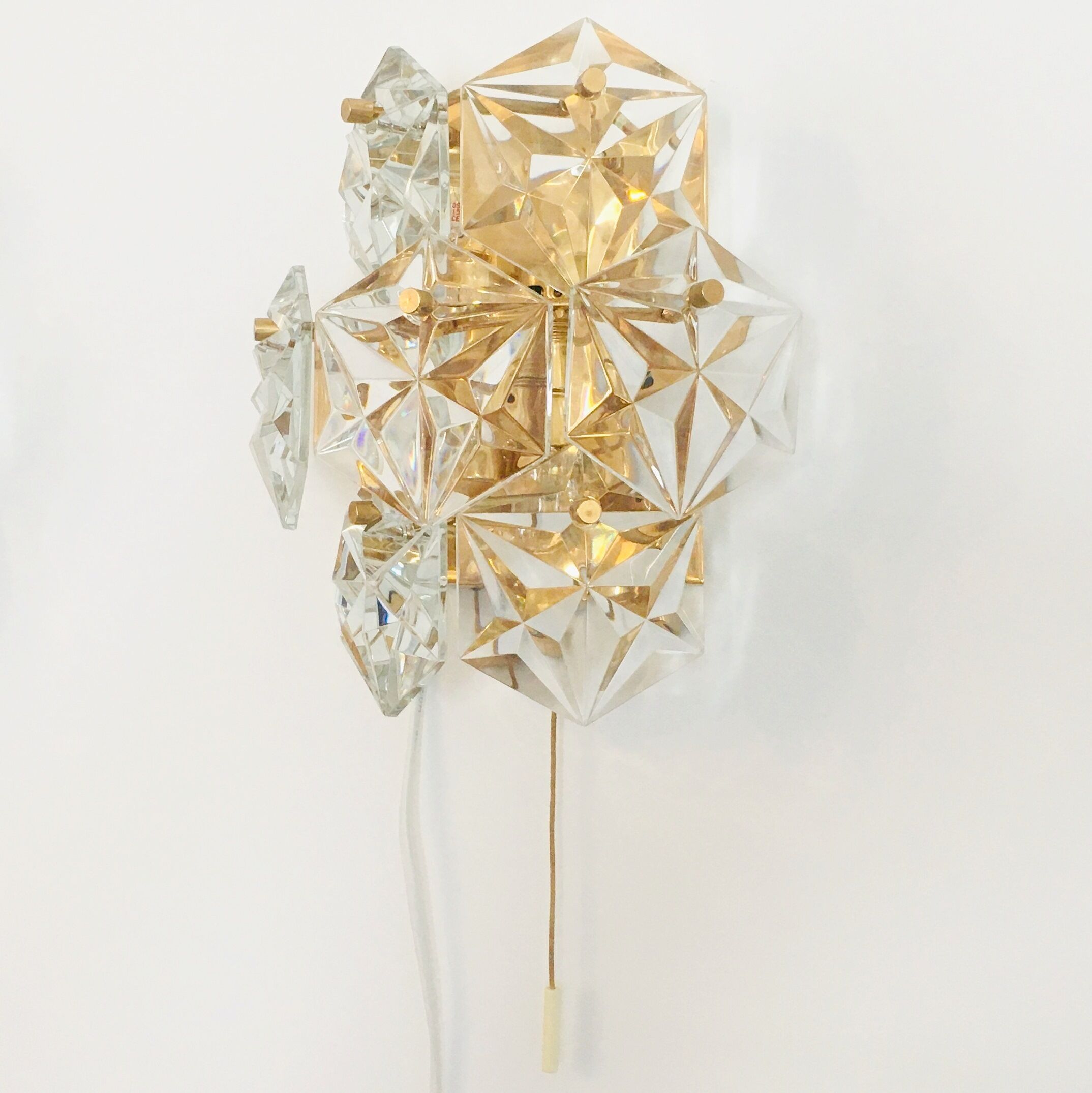 Pair of faceted crystal wall lights / sconces by Kinkeldey, Germany, 1970s