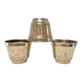 Three pot covers brass silver cover golden patina monogram early twentieth century