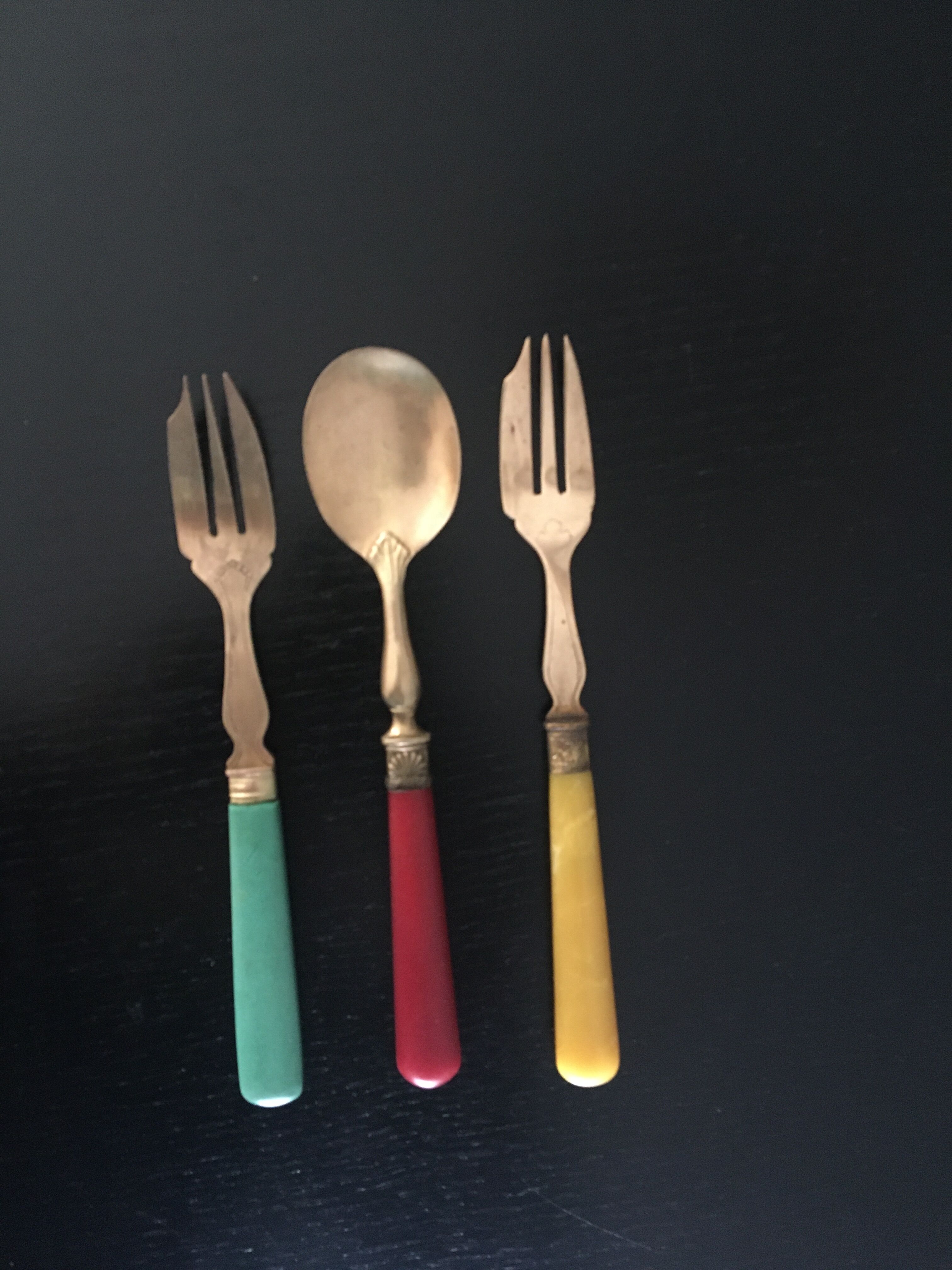 Set of brass dessert forks