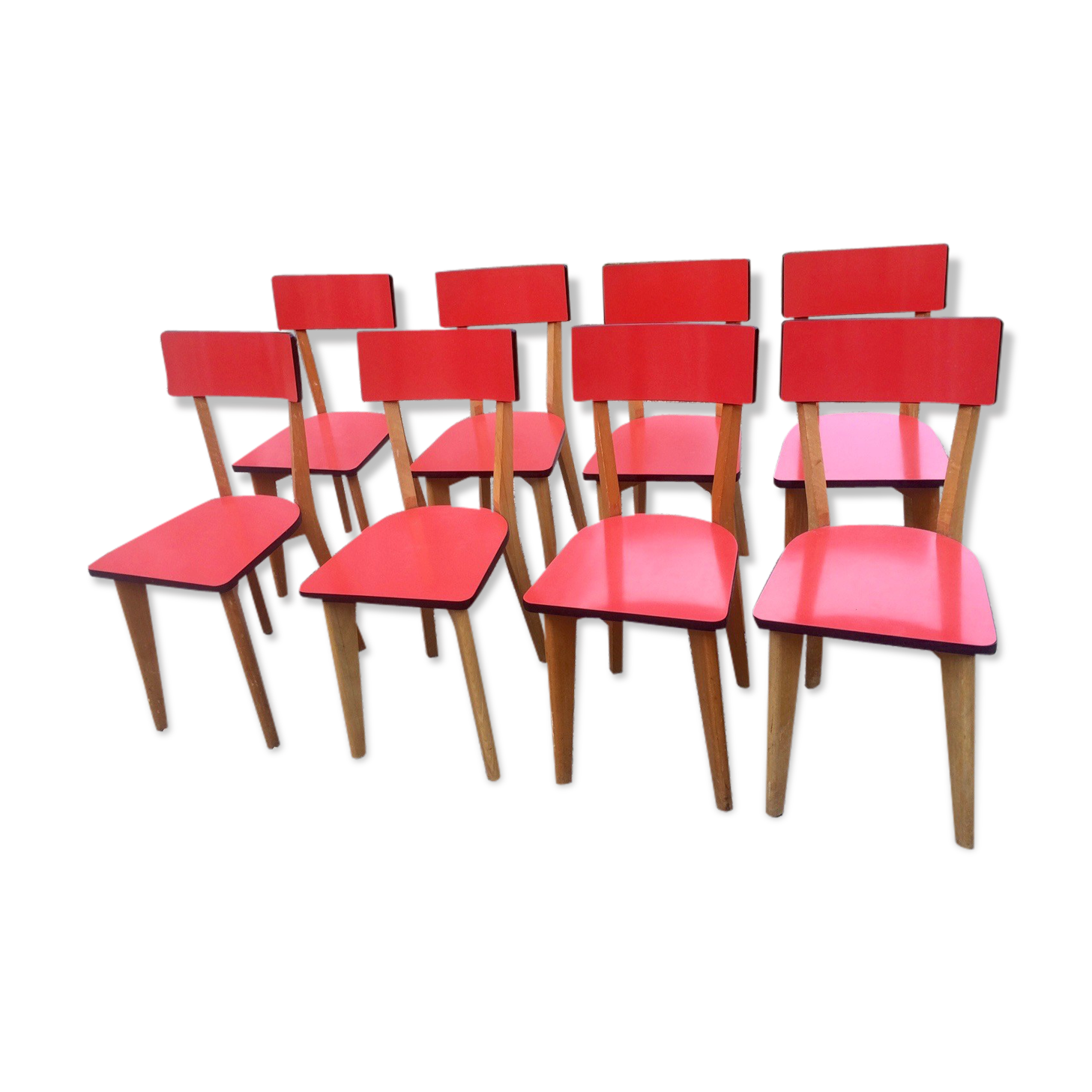 Eight wooden and formica chairs