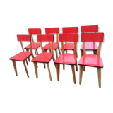 Eight wooden and formica chairs