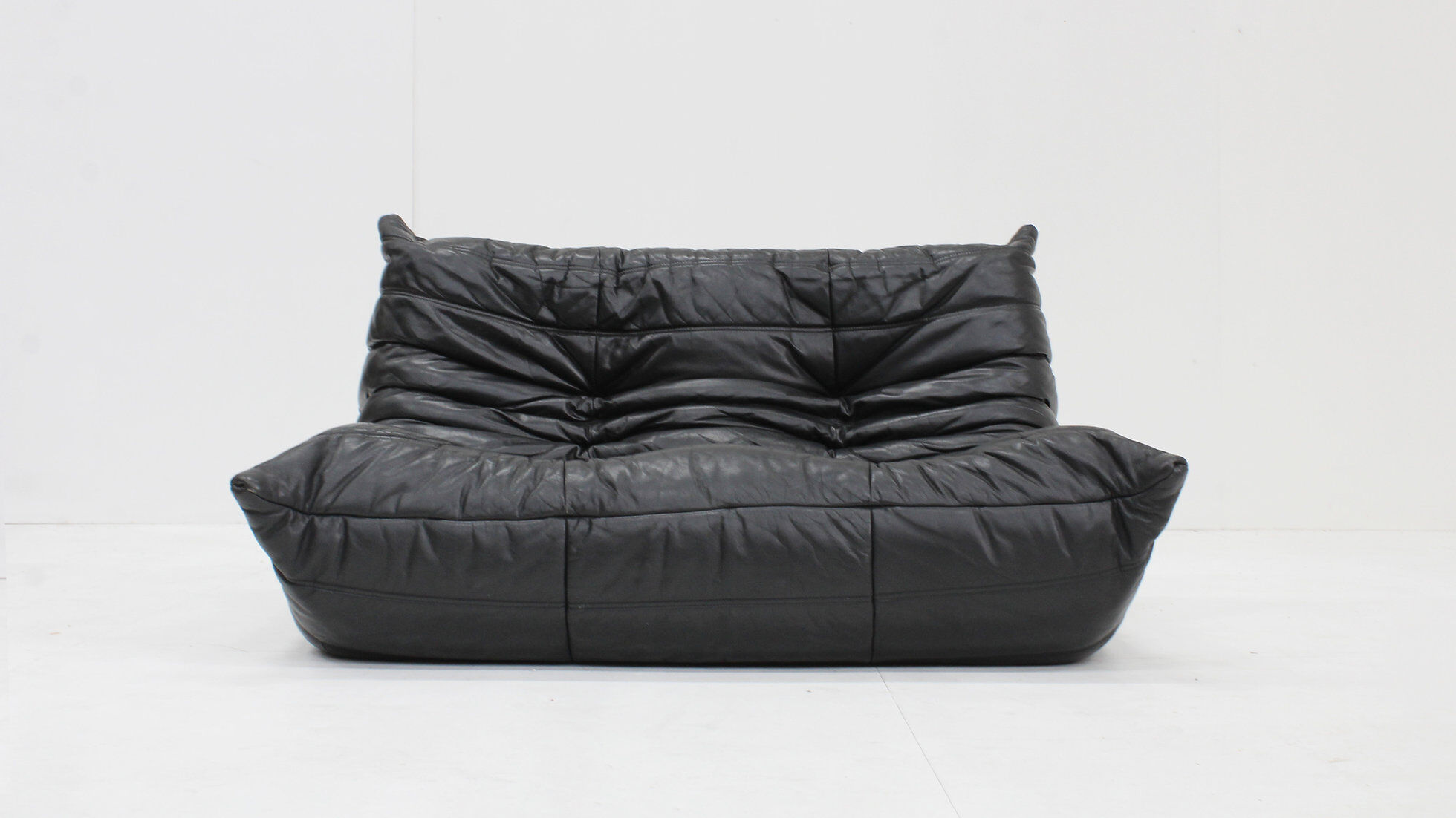 Vintage Togo Ligne Roset 2 seater sofa black leather by Michel Ducaroy 1990s