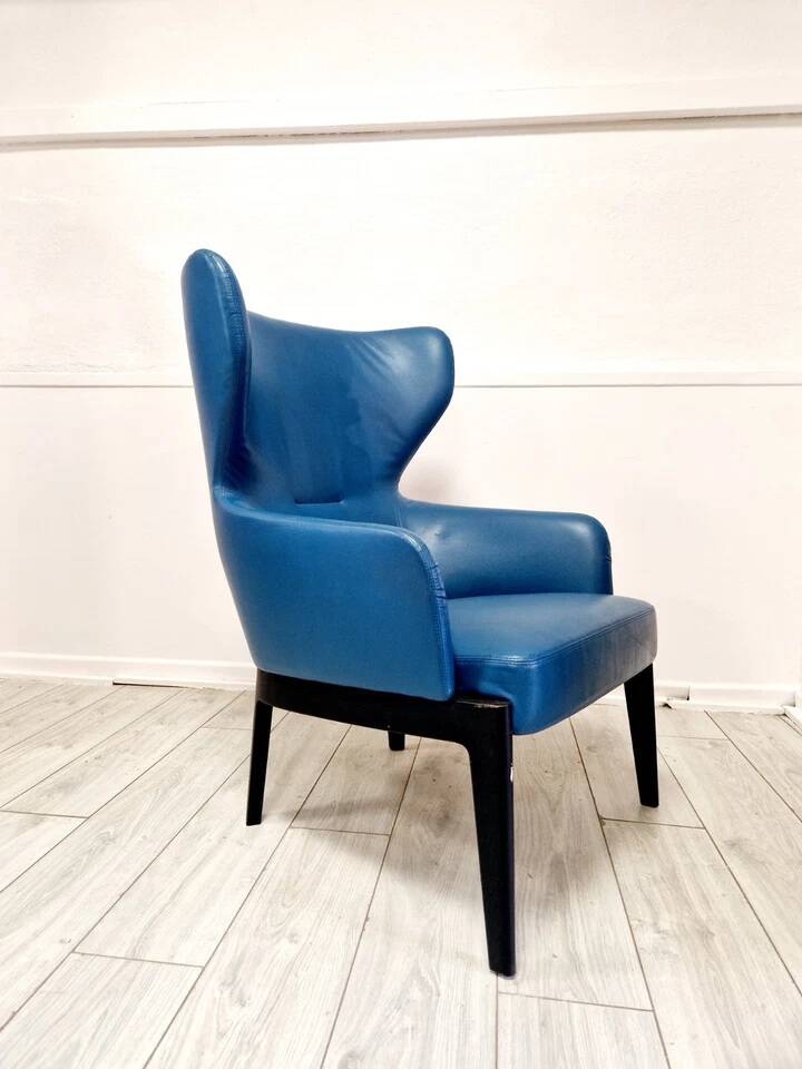 High-back armchair by Rodolfo Dordoni