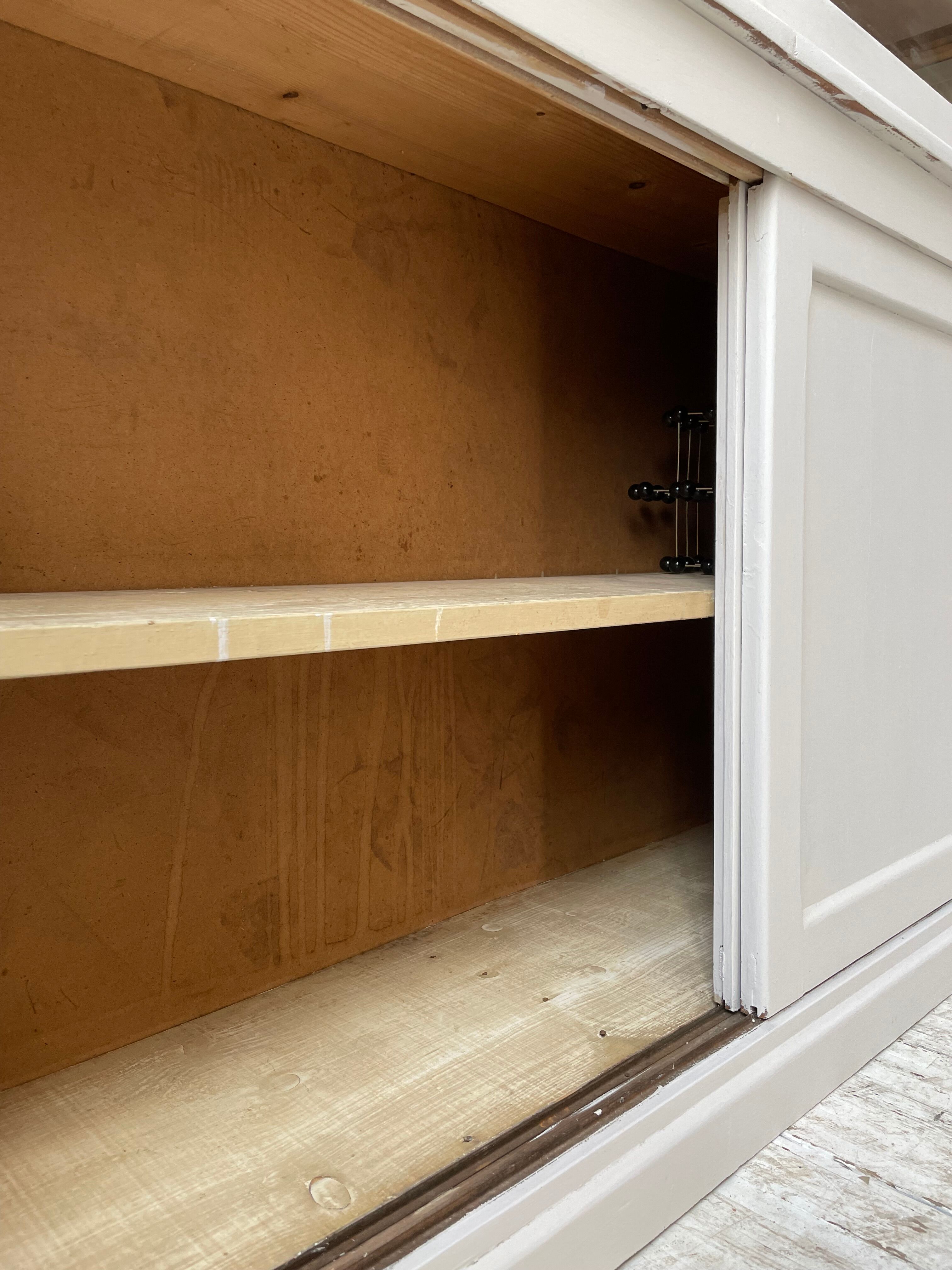 Library showcase ivory white sliding doors