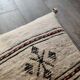Off-white Berber cushion with wool pompom