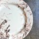 Ironware cake plate from Creil and Montereau, "Glaïeul" service