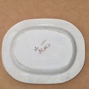 Large oval dish in blue and white English earthenware with Asian decoration, 19th century.