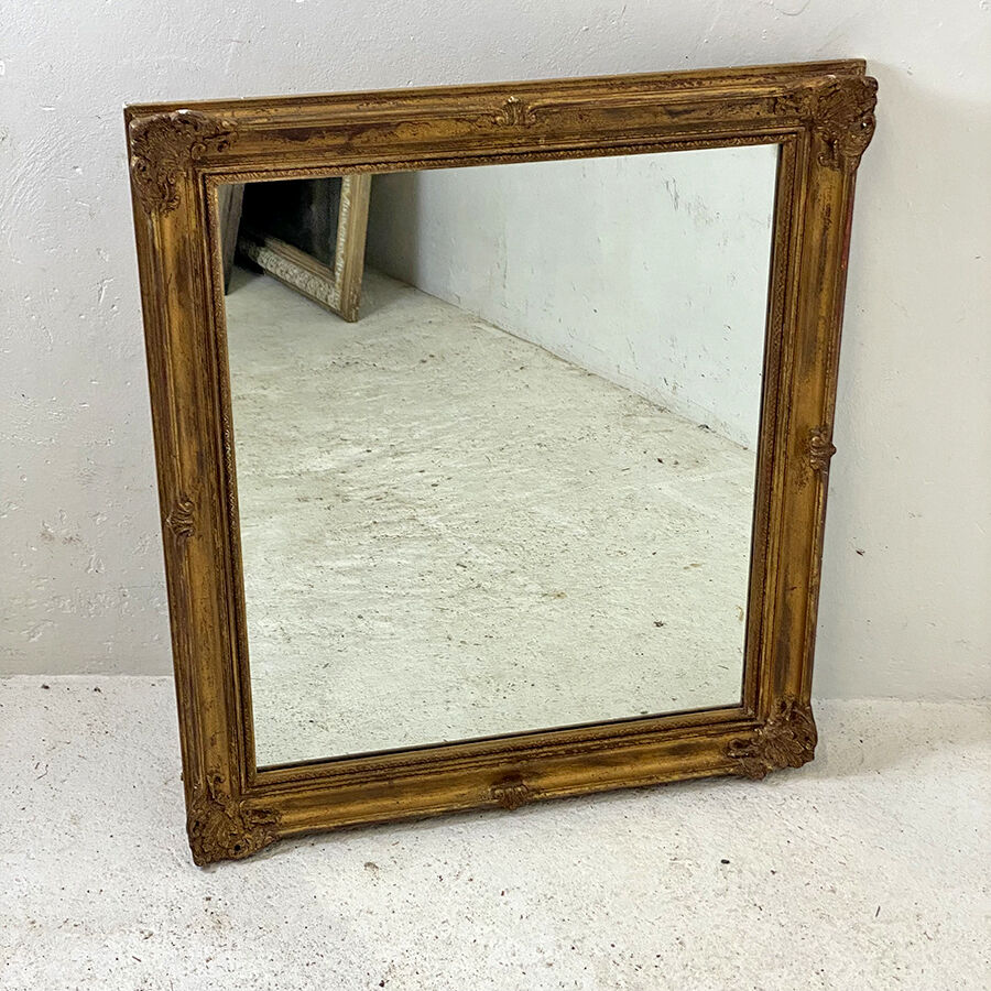 Wooden mirror and gilded stucco Louis XIV style