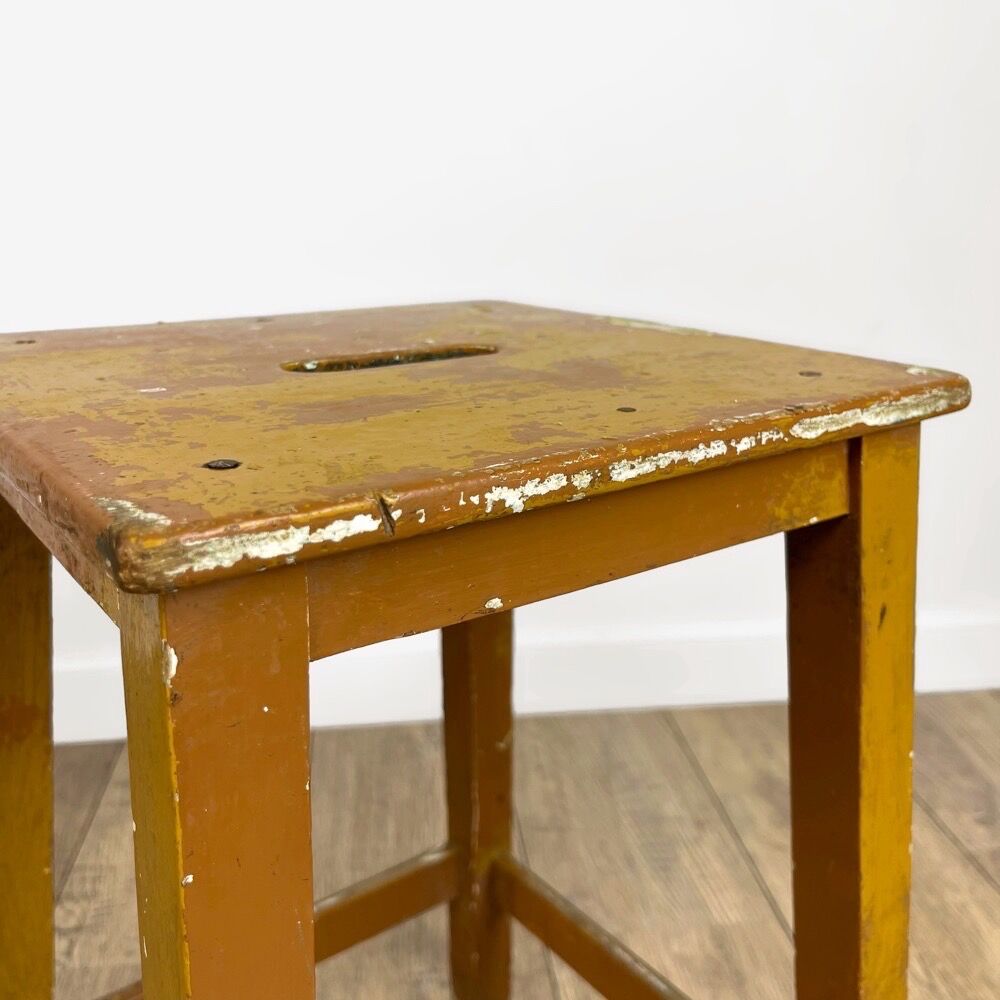 Old slotted milking stool