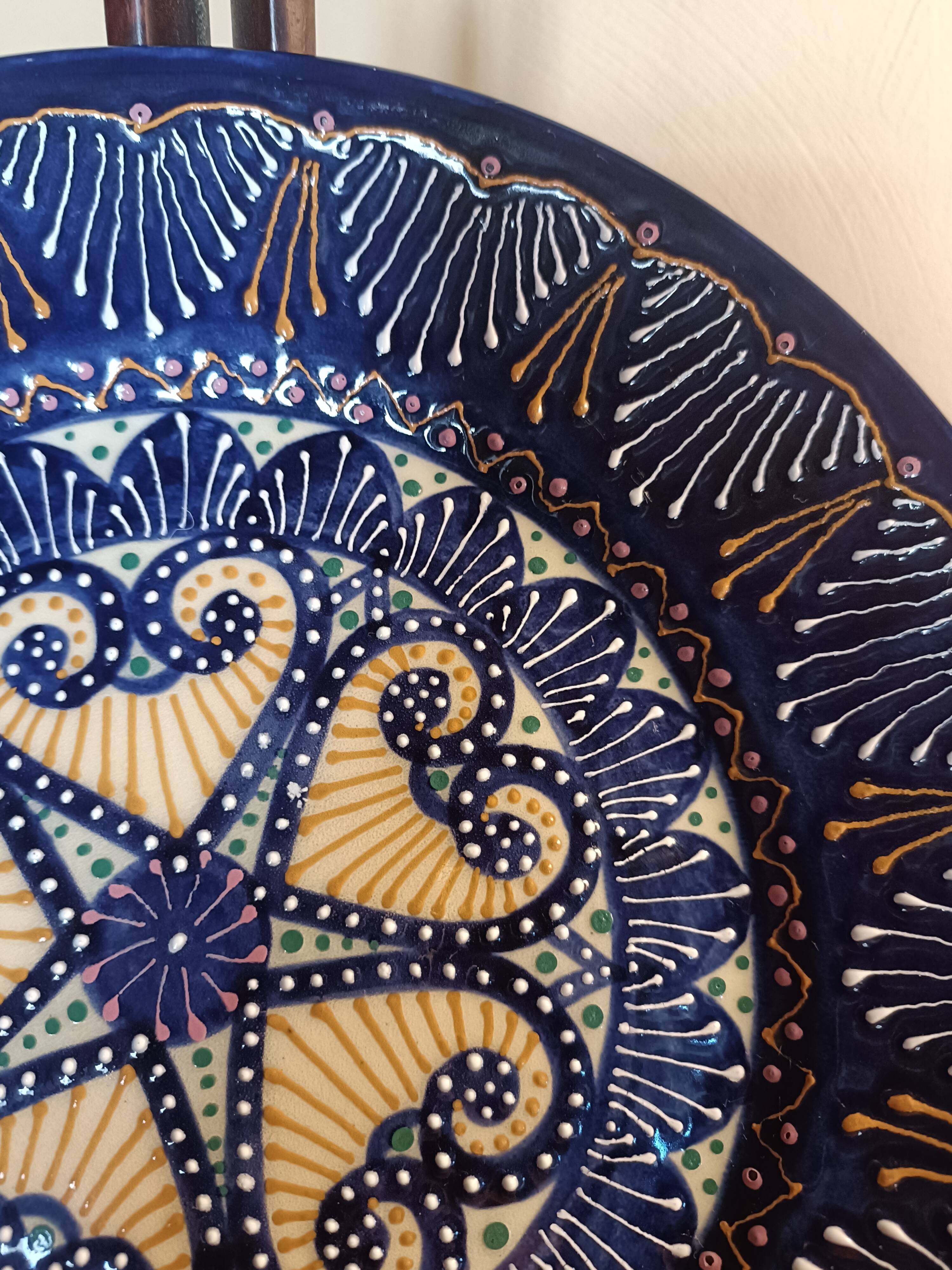 Two HB Quimper faience plates with pearl/embroidery decoration.