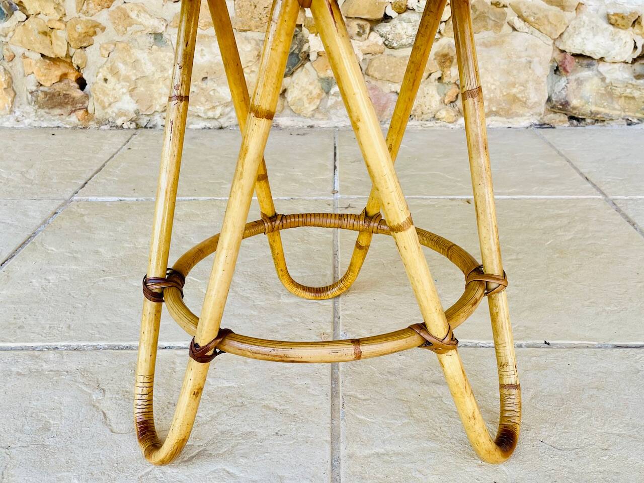Vintage rattan and bamboo side table, circa 1969.