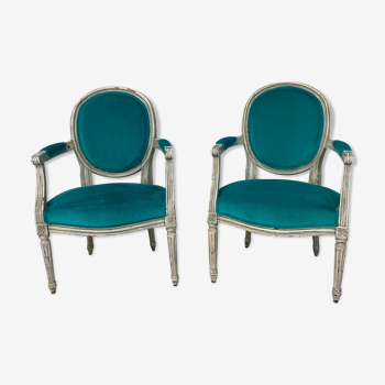 Pair of Louis XVI convertible armchairs