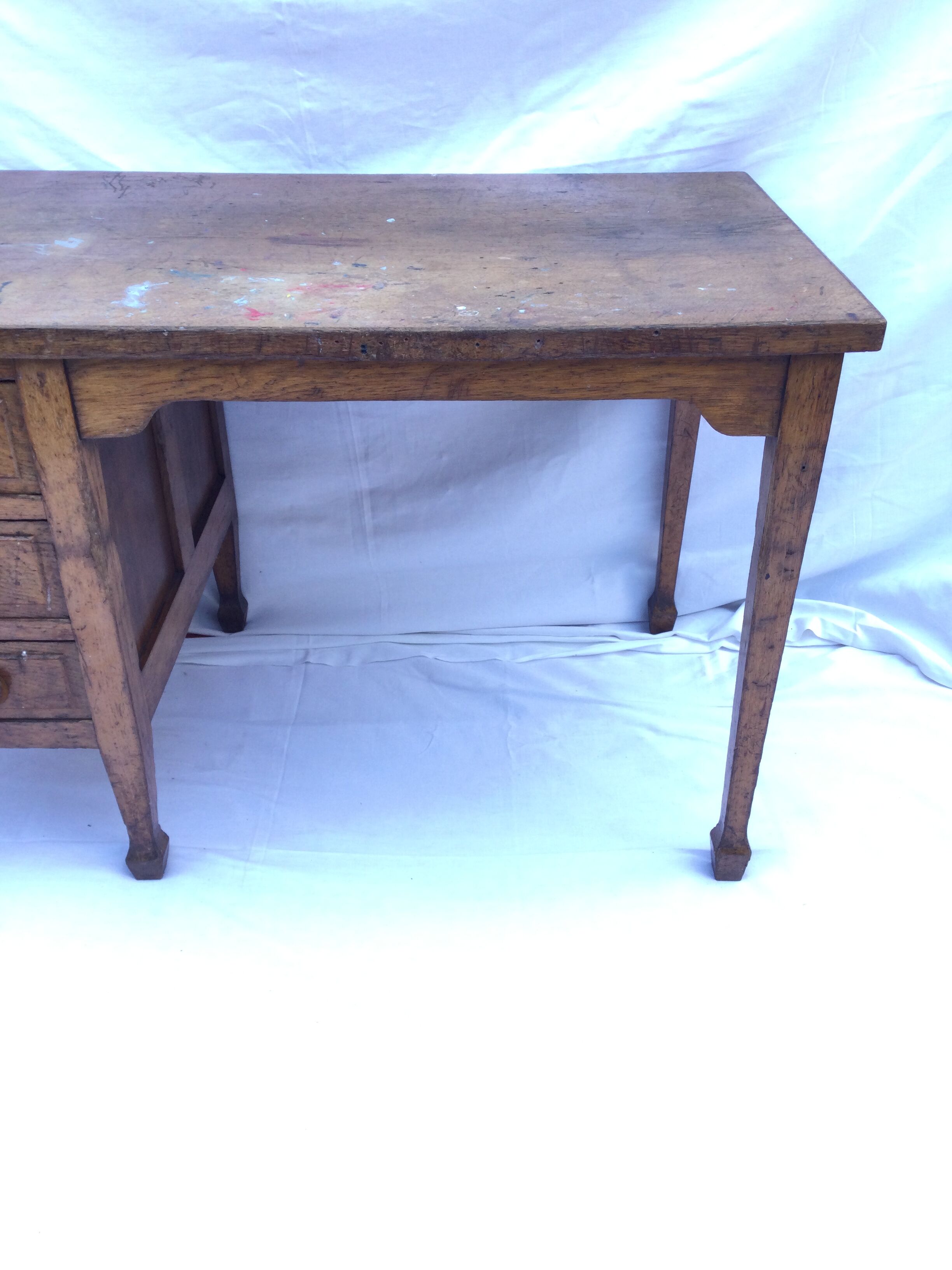 Wooden desk with three drawers