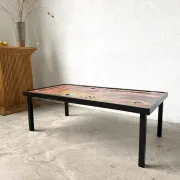Coffee table by Robert and Jean Cloutier in enamelled lava and metal, 1950s.