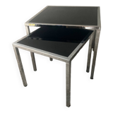 Pair of nesting tables in chromed metal and glass