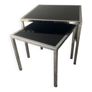 Pair of nesting tables in chromed metal and glass