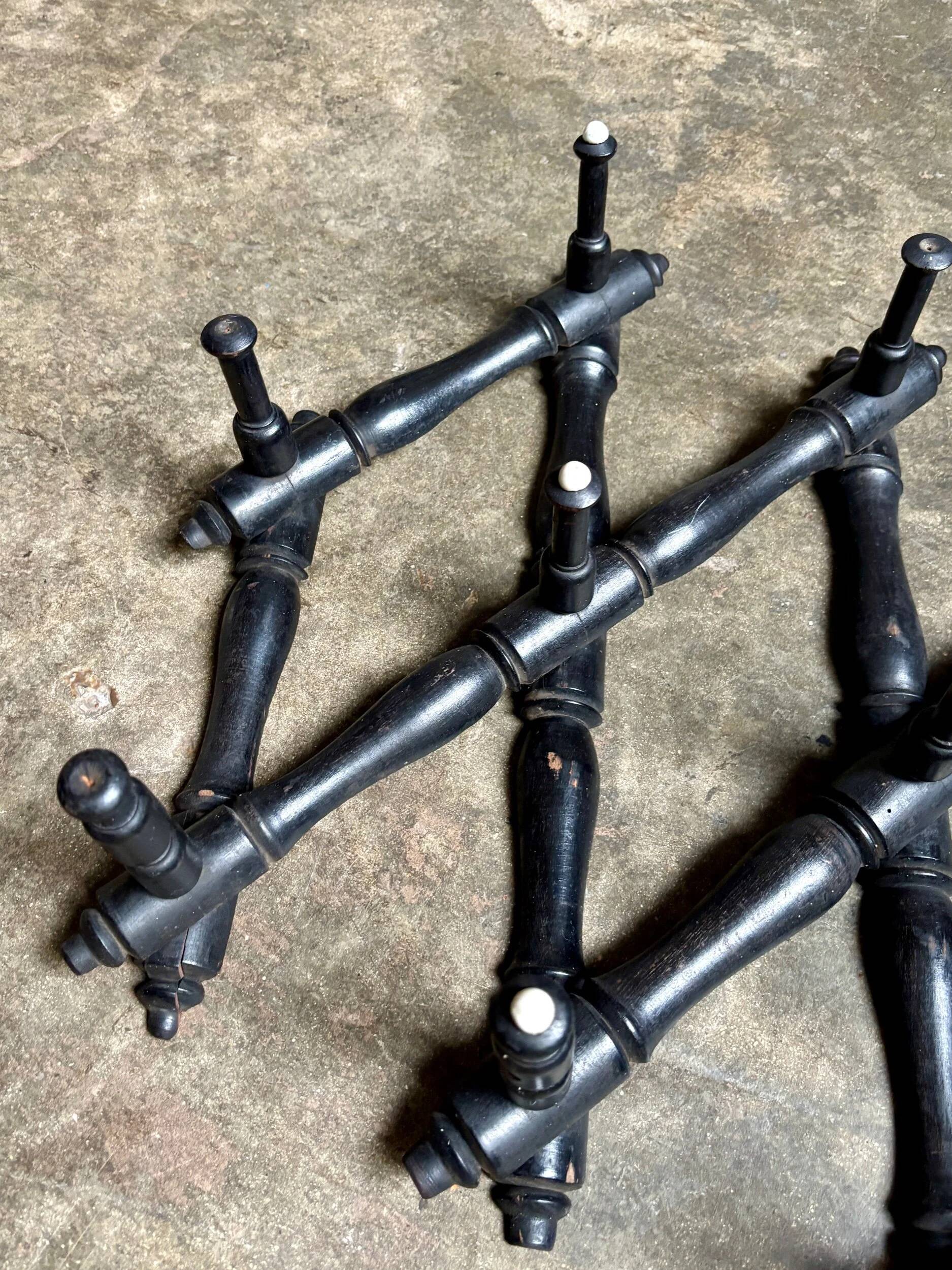 Napoleon III hinged wall-mounted coat rack in black wood