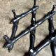 Napoleon III hinged wall-mounted coat rack in black wood