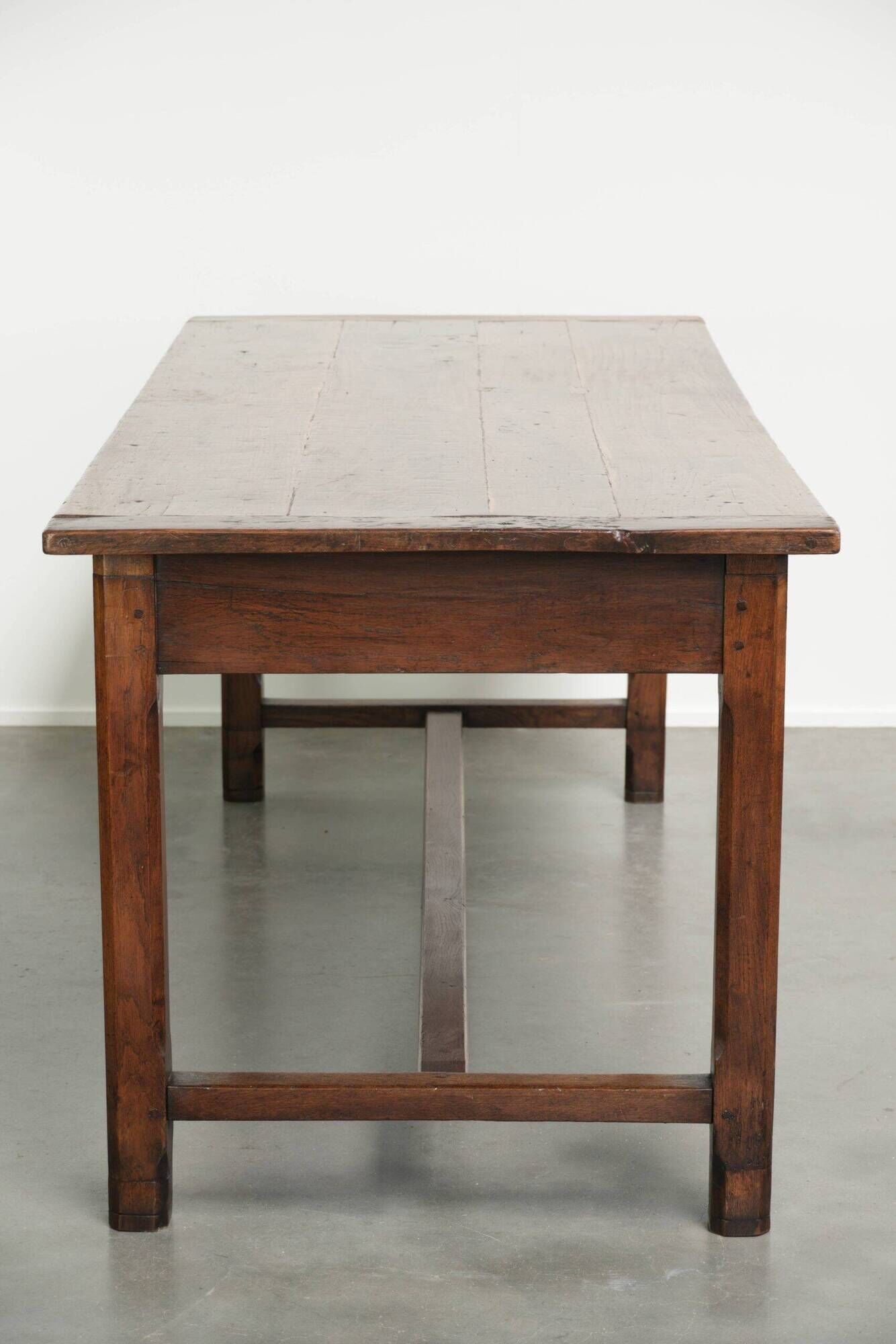 18th century French farmhouse dining table made of oak and fruitwood