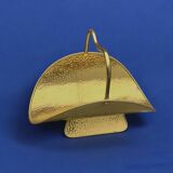 Vintage hammered brass log holder