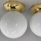 Set of three mid-century brass and milk glass ceiling ligts, restored