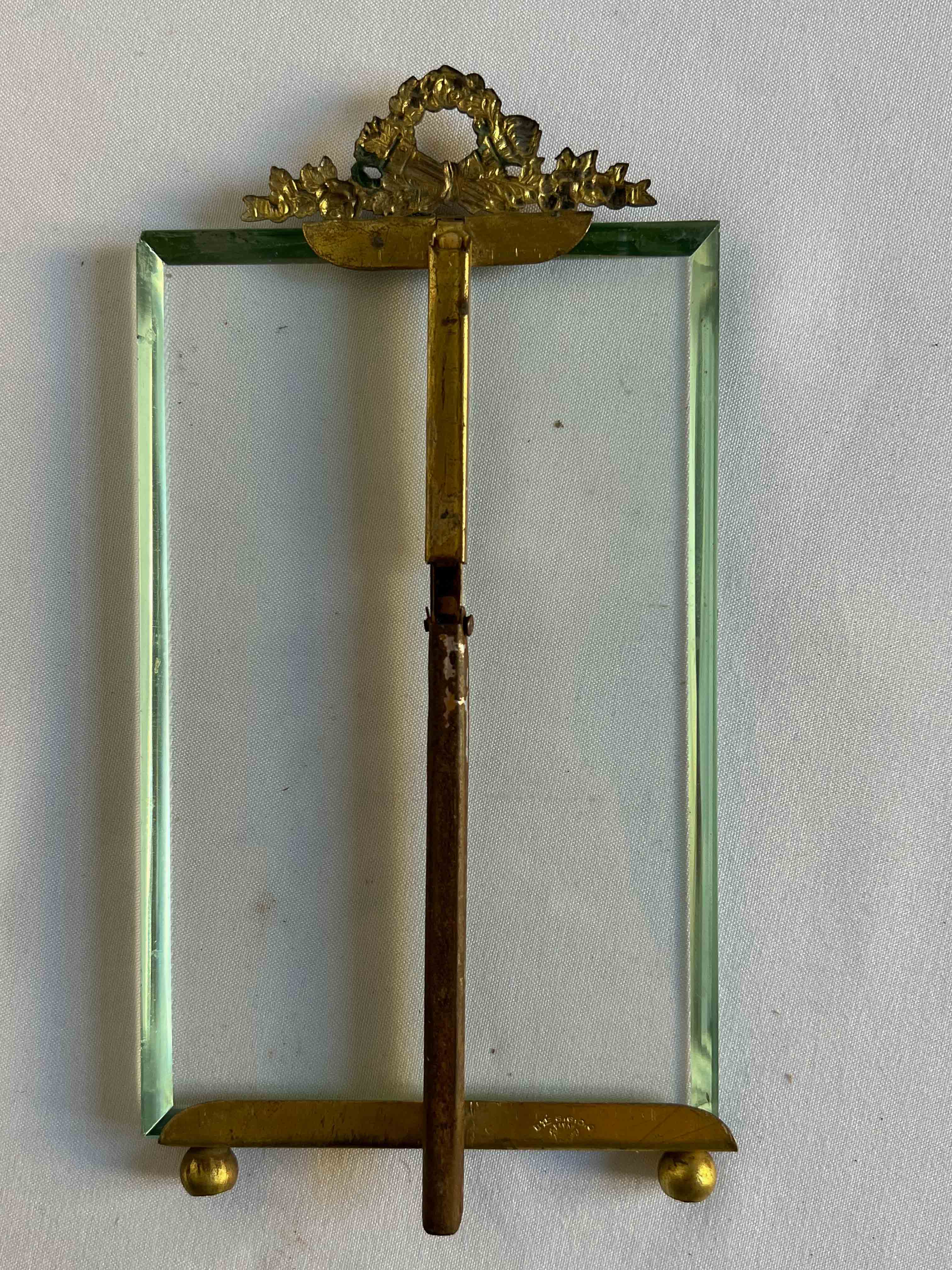 Brass frame and beveled glass