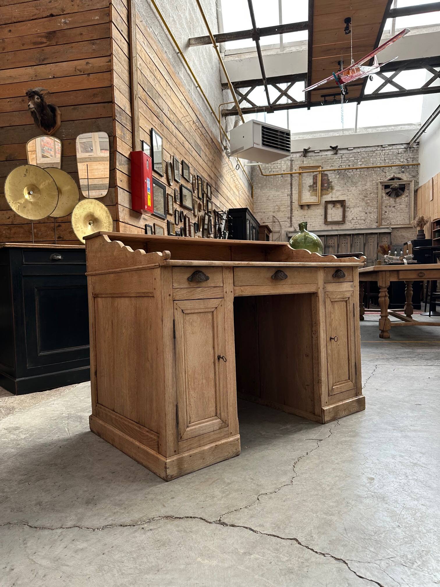 Solid oak reception desk, early 20th century