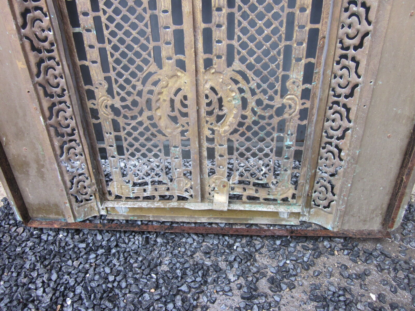 Front of the old fireplace all in bronze