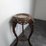 Carved selette with chimera decoration