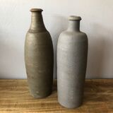 2 old sandstone bottles