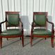 Paire de fauteuils de style Empire en acajou et cuir vert